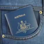 Passport of Australia in pocket jeans. Travel, tourism, emigration and passport control concept.
